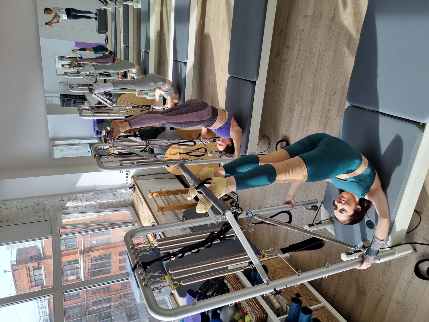 Занятие Pilates в мини-группе на оборудовании Tower